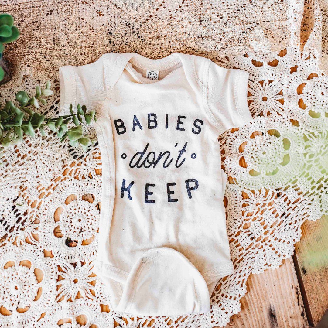 Newborn baby girl on sale onesie